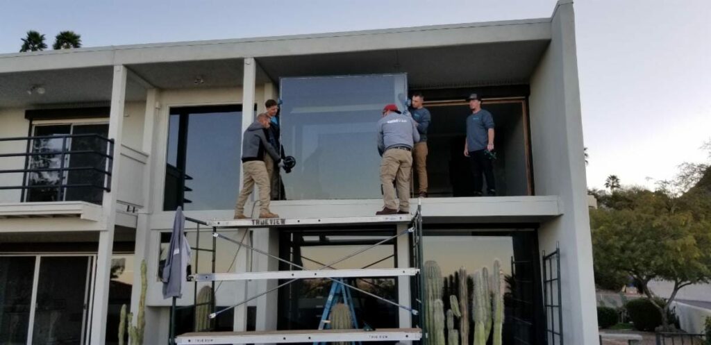 true view team installing second floor window